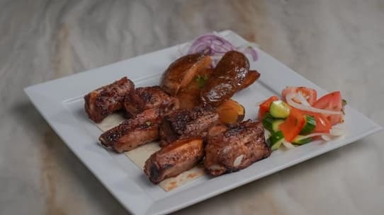 Lula Kebab hand-minced beef, chicken or lamb skewers on a mangal grill